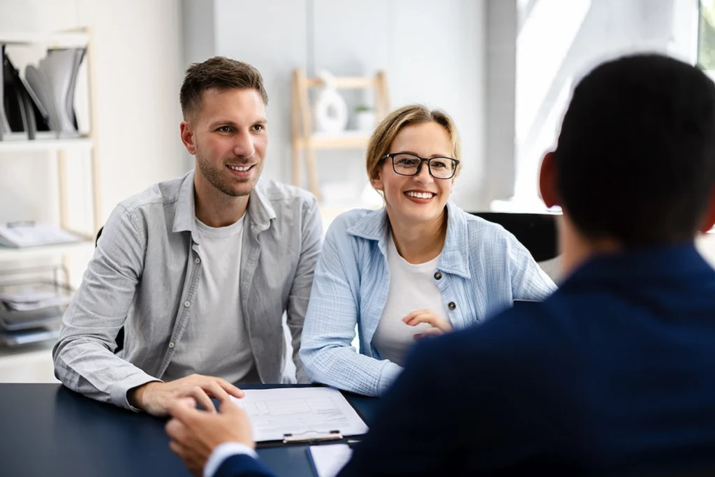 the real estate services agent explain the new couple customer